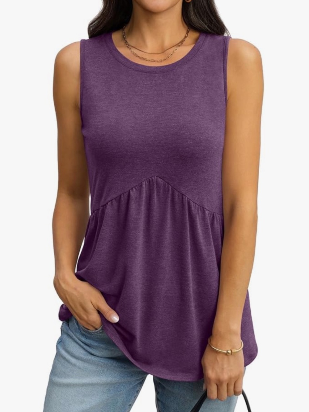 Comfortable sleeveless women’s tank with a flattering peplum seam. Soft, breatha